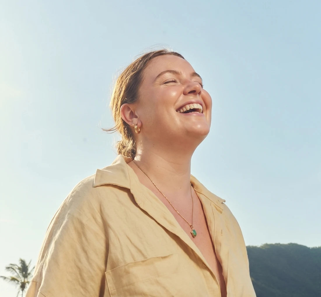 A woman enjoying a peaceful moment outdoors