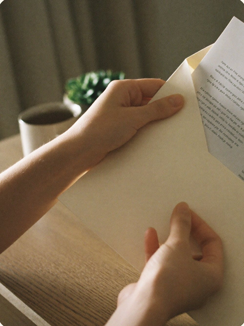 Opening an envelope containing a written assessment report